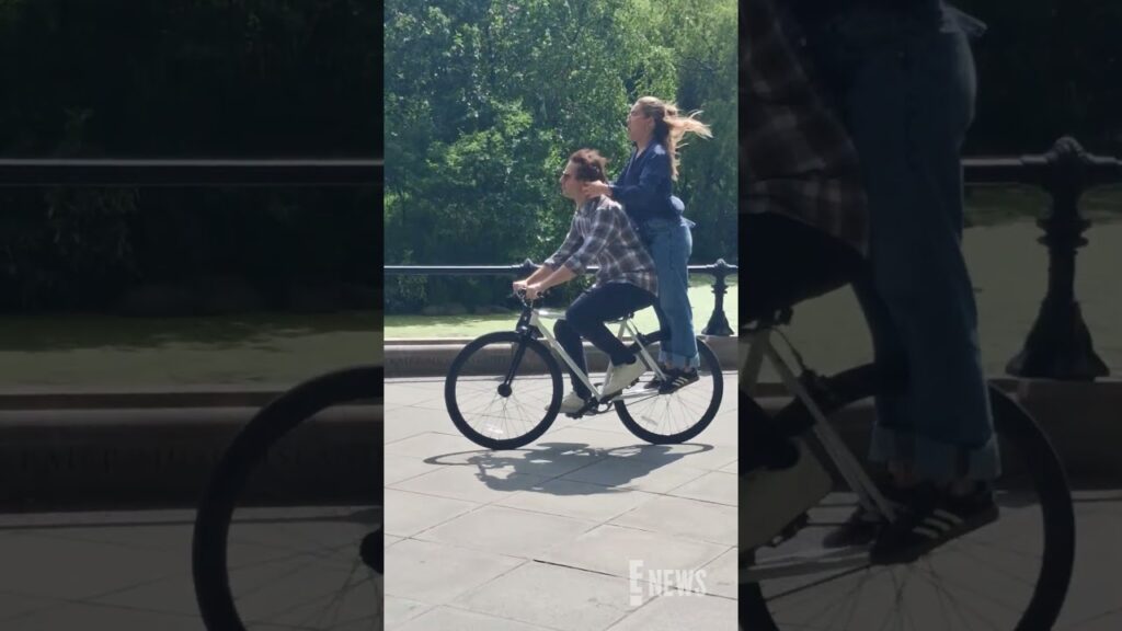 Andy Samberg and Florence Pugh were spotted riding a bike on the set of “42.6 Years” in NYC. Andy Samberg and Florence Pugh were spotted riding a bike on the set of "42.6 Years" in NYC.