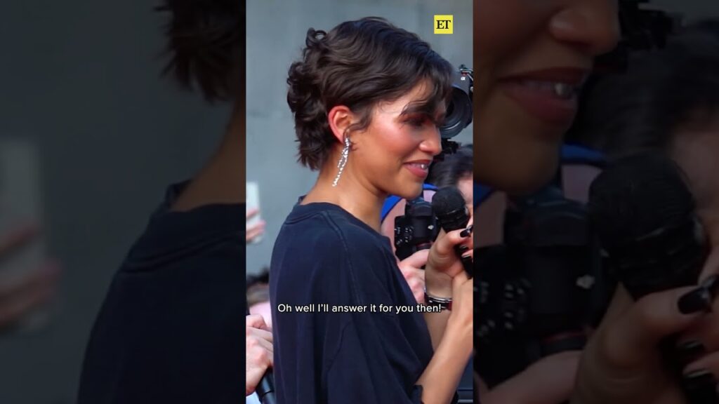 #zendaya helps #tomholland  out at #paris  #spiderman event