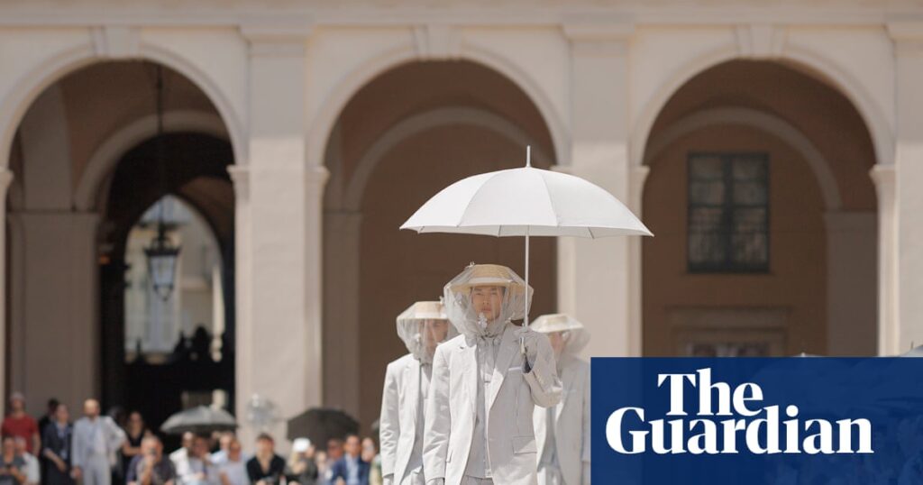 Behold the sunbrella, fashion’s stealth accessory for a heatwave | Fashion