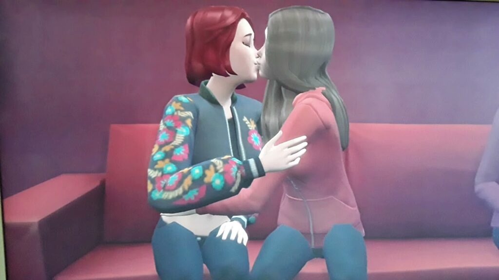 Scarlett Johansson and Elizabeth Olsen kissing on the sofa