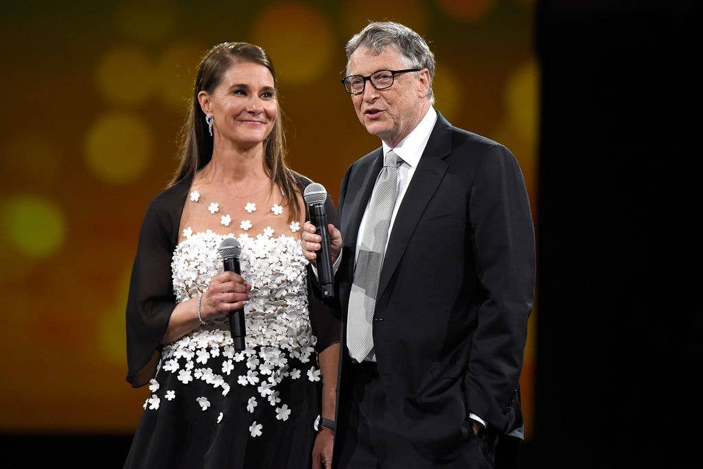 Melinda Gates and Bill Gates speak on stage during The Robin Hood Foundation's 2018 benefit at Jacob Javitz Center on May 14, 2018 in New York City