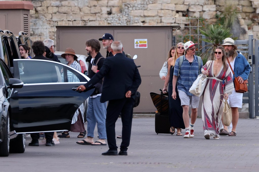 Chris Stapleton, Morgane Stapleton, Dave Cobb, and Richard Collins attend Dua Lipa and Callum Turner's wedding weekend in Italy