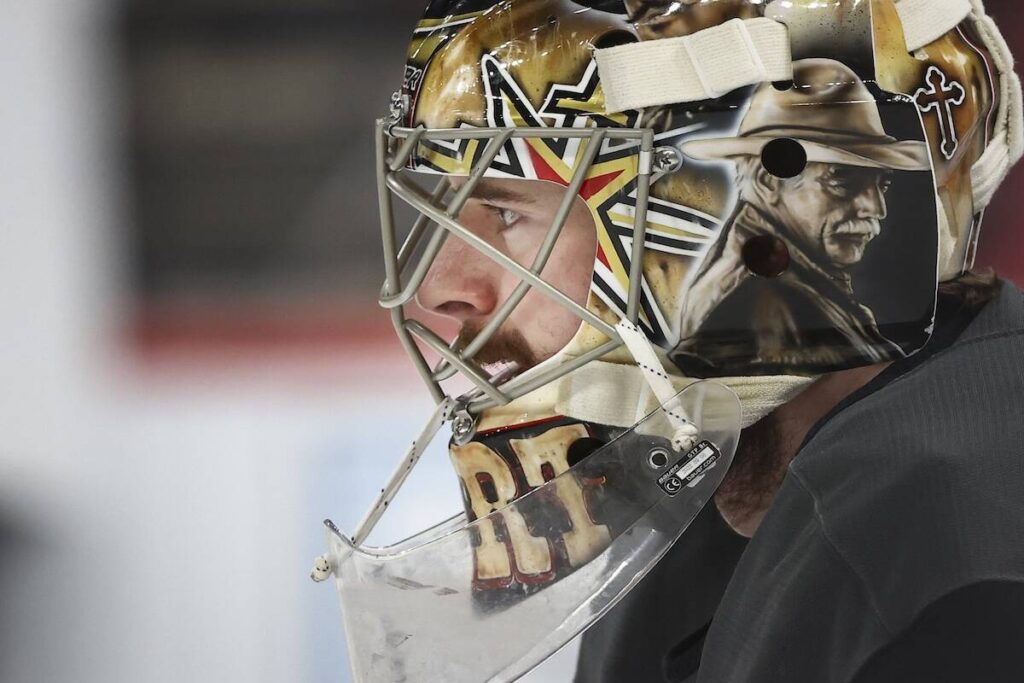Golden Knights’ Carter Hart’s goalie helmet doesn’t include controversial celebrity images | Golden Knights Golden Knights goaltender Carter Hart (79) participates in the team’s morning skate ahea ...