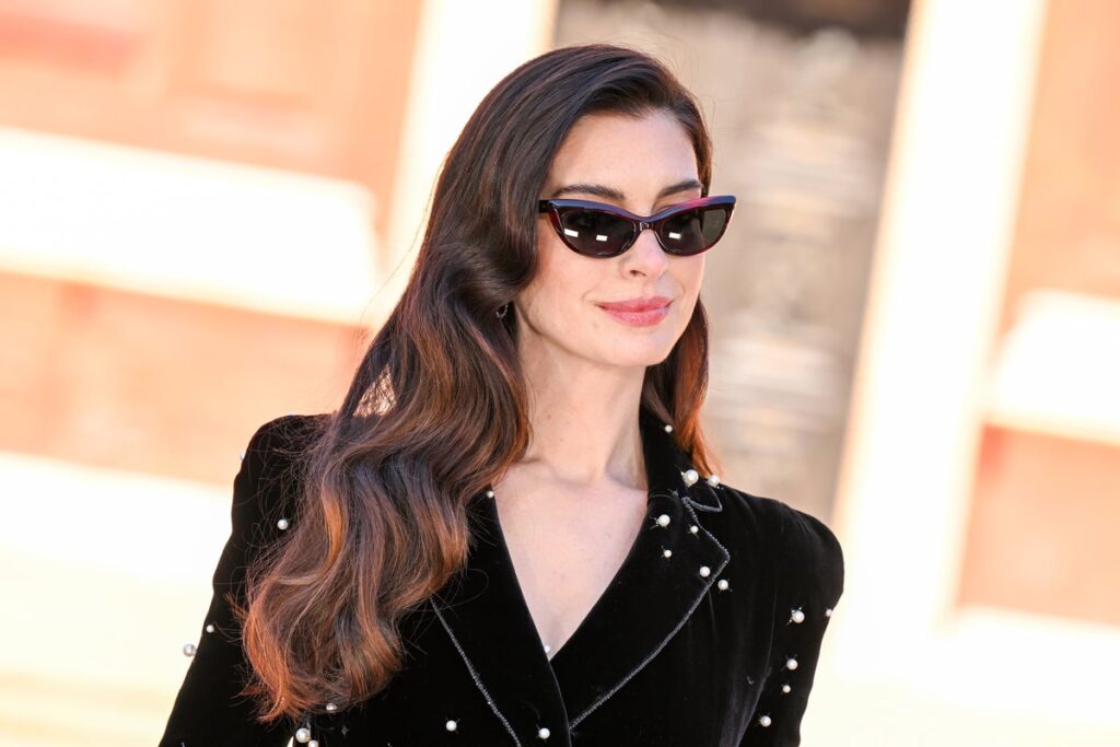 Anne Hathaway expecting third child as she reveals baby bump in surprise video - The Independent