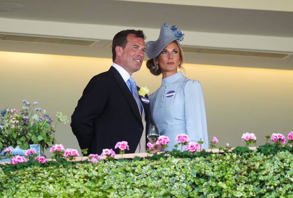 Peter Phillips with his wife Harriet dressed in blue at Ascot