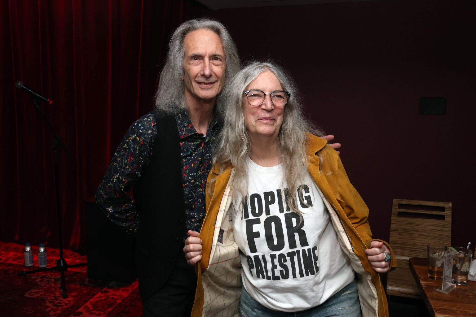 Lenny Kaye with Patti Smith at a GRAMMY Museum Event last night, with Patti wearing a Hoping For Palestine shirt