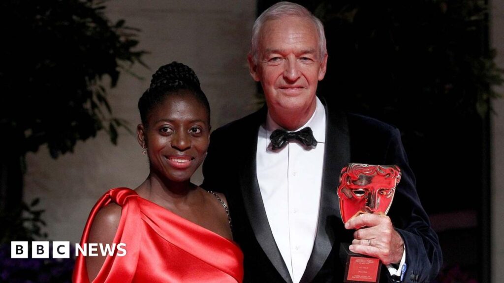 Jon Snow in a black jacket and bow tie at the Bafta Awards