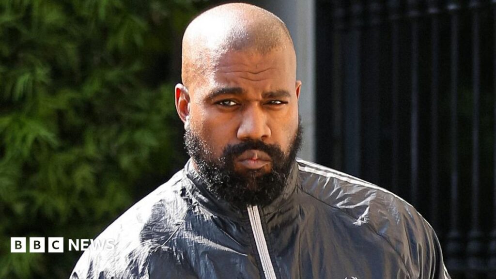 Kanye West: Model who alleges rapper choked her says she felt ‘suffocated and scared’ A woman holds up a sign saying "Lyhanna" with hearts surrounding it, during a protest in Paris, France on 8 June.