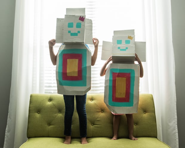 Two girls wearing homemade robot costumes