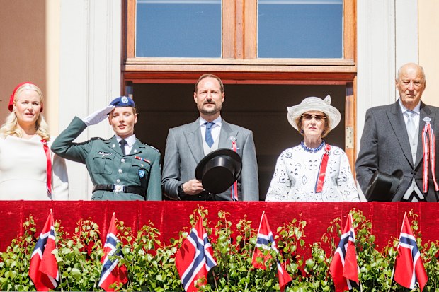 Crown Princess Mette Marit, Princess Ingrid Alexandra, Crown Prince Haakon Magnus, Queen Sonja and King Harald greet the children's parade at the Royal Castle during the Norwegian National Day on May 17, 2024