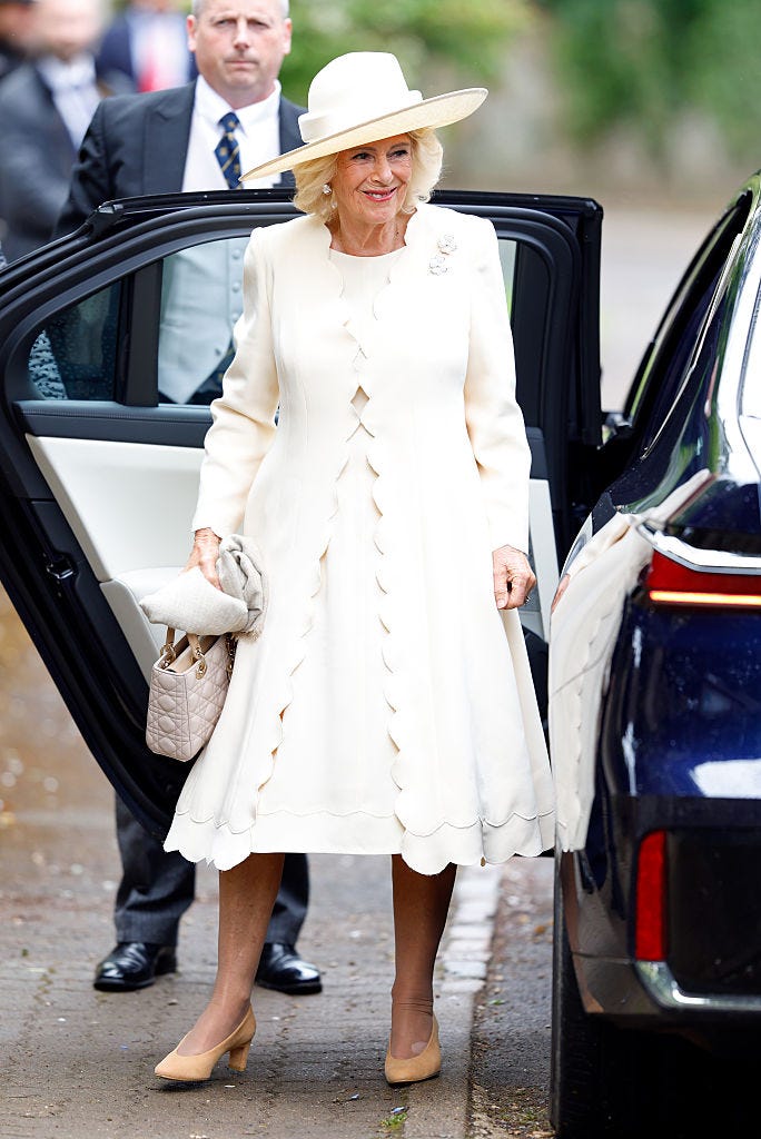 kemble, england june 06: (embargoed for publication in uk newspapers until 24 hours after create date and time) queen camilla attends the wedding of peter phillips and harriet sperling at all saints church on june 6, 2026 in kemble, england. peter phillips, son of princess anne, princess royal and eldest grandchild of queen elizabeth ii, will marry nhs nurse and writer harriet sperling during a ceremony at all saints church in kemble today. (photo by max mumby/indigo/getty images)