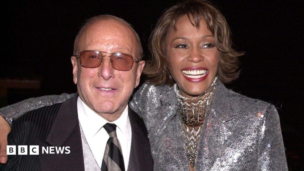 Clive Davis, music mogul behind Whitney Houston and Bruce Springsteen, dies aged 94 Clive Davis at the Grammys, wearing a black sequinned suit jacket.