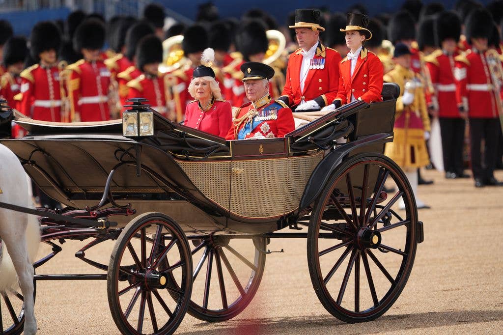 King Charles III and Queen Camilla arrive in the Ascot Landau carriage for the Trooping the Colour ceremony
