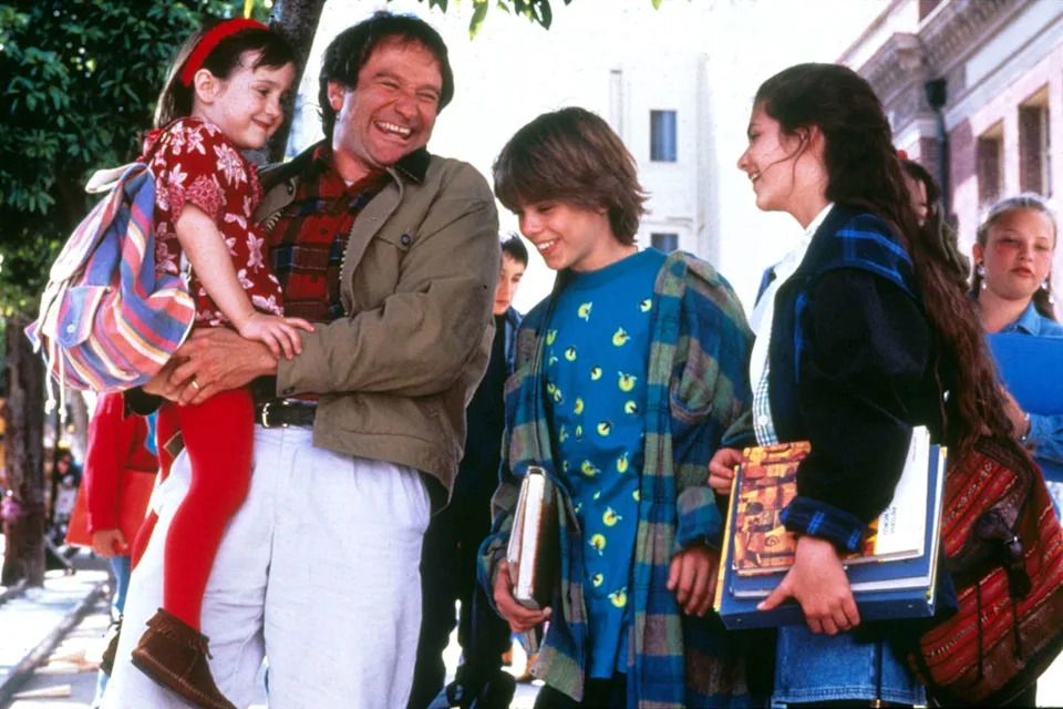 Mara Wilson, Robin Williams, Matthew Lawrence, and Lisa Jakub in 'Mrs. Doubtfire.'Credit: Moviestore/Shutterstock