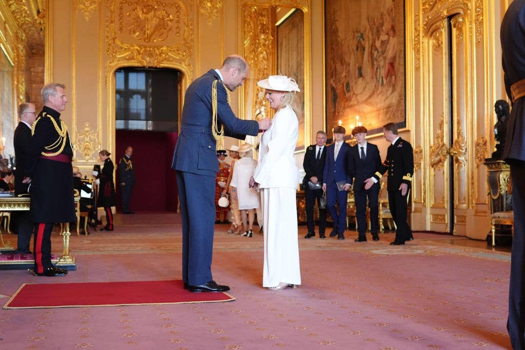 Sally Lindsay, an actor from London, is made a Member of the Order of the British Empire by the Prince of Wales