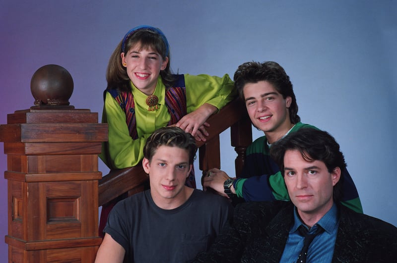 Mayim Bialik rose to fame portraying Blossom Russo in "Blossom." Pictured here with cast members Joseph Lawrence, Ted Wass, and Michael Stoyanov in 1990.