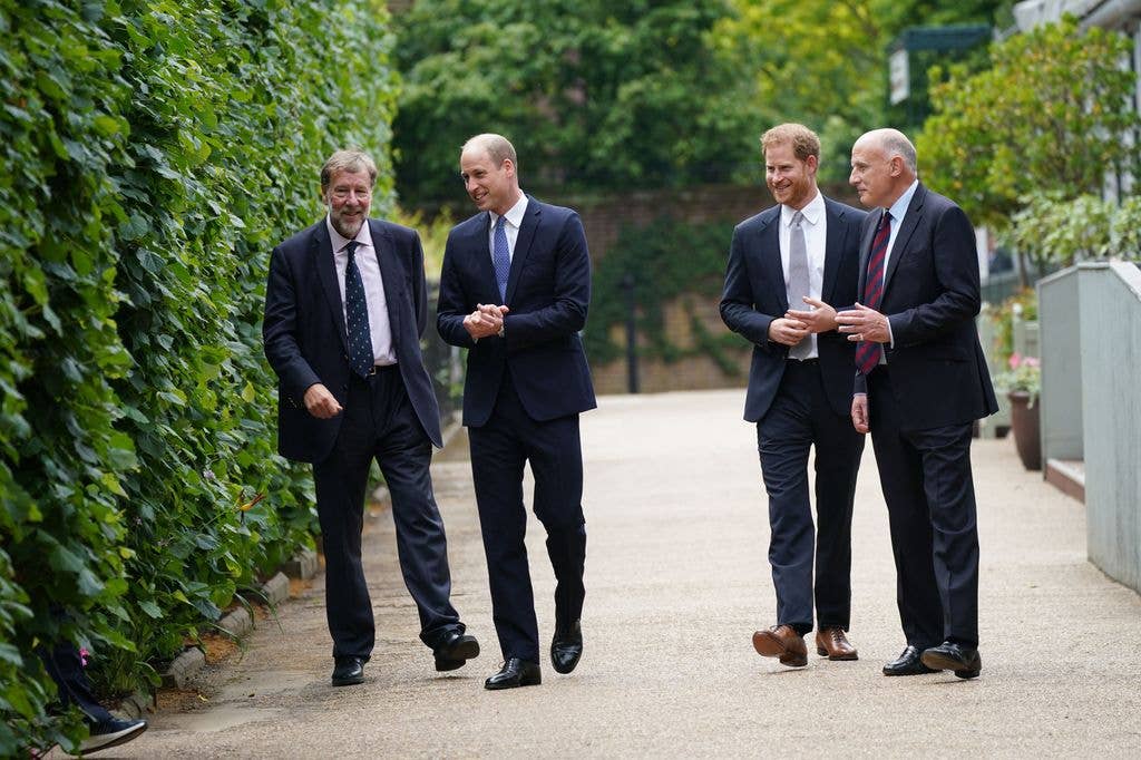 Prince William and Prince Harry with Jamie Lowther-Pinkerton (right) in 2021