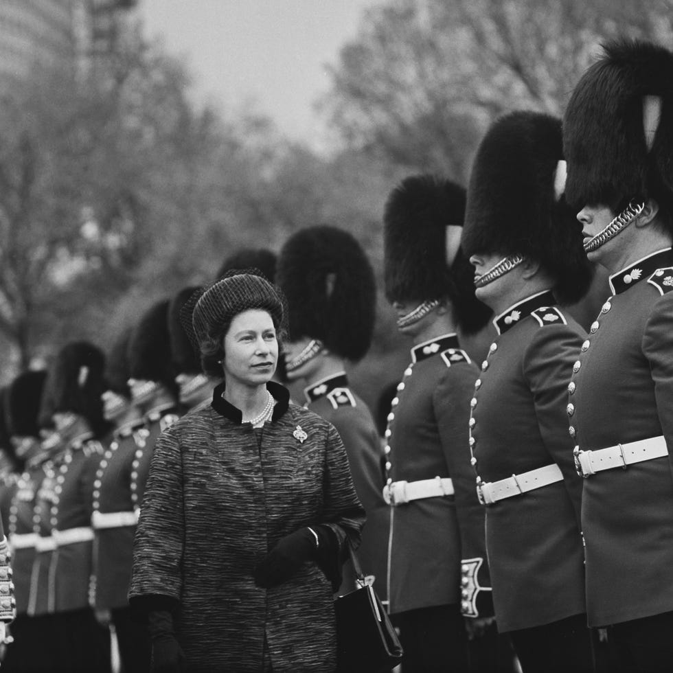 british royal queen elizabeth ii inspects the grenadier guards during a military inspection in the gardens of buckingham palace in london, england, 17th may 1962. (photo by evening standard/hulton archive/getty images)