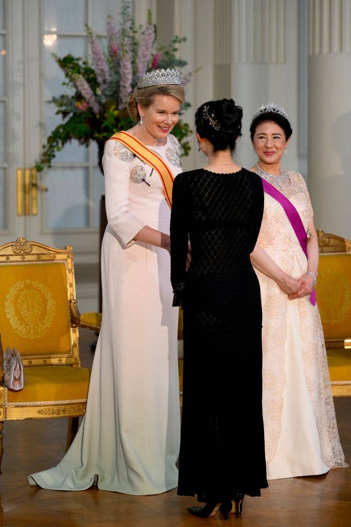 Queen Mathilde of Belgium and the Empress Masako Owada of Japan pictured during the State Banquet at Laeken Castle