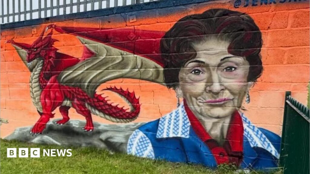 Eastenders legend Dot Cotton appears on mural in Pontyates Murals of a dragon and Dot Cotton