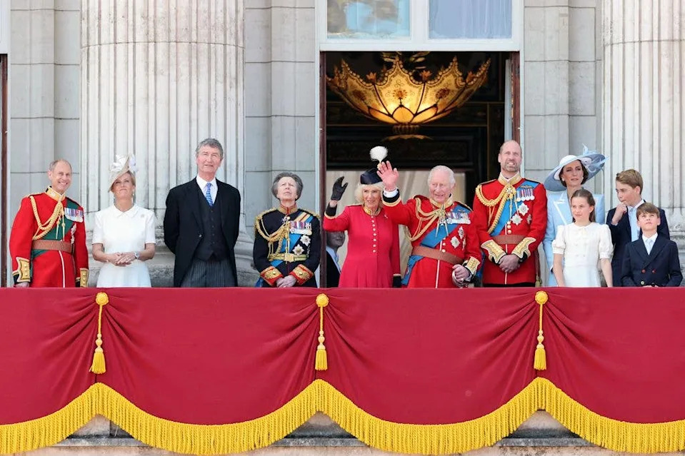 The family were all smiles on the balcony