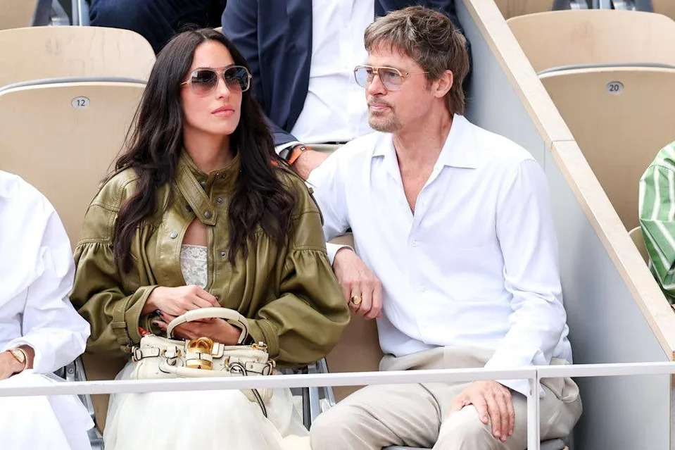 Ines de Ramon and Brad Pitt attend Day Fourteen of the 2026 French Open on June 06, 2026 in Paris, France