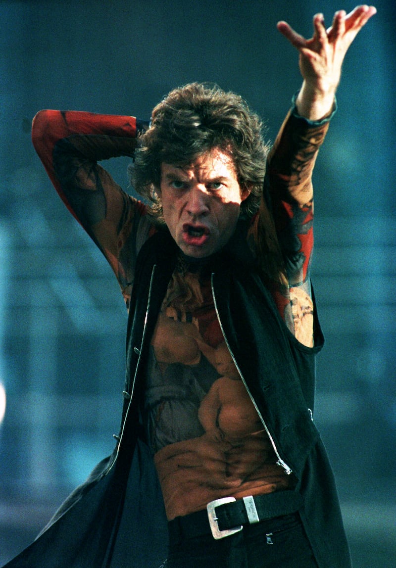 Mick Jagger on stage performing to a crowd of 70,000 spectators in Germany in 1995.