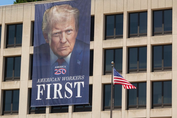 A banner of Trump with the “250” branding is displayed last month on the U.S. Department of Labor Frances Perkins Building in Washington, D.C.
