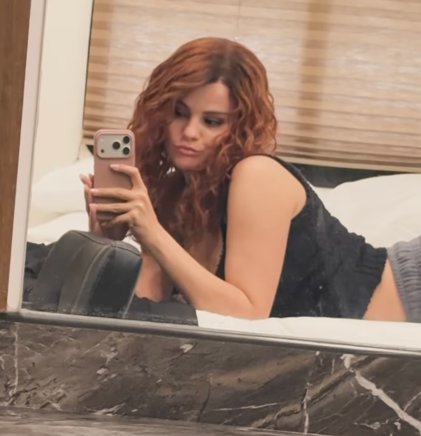 Selena Gomez with curly red hair. Selena Gomez with curly red hair.
