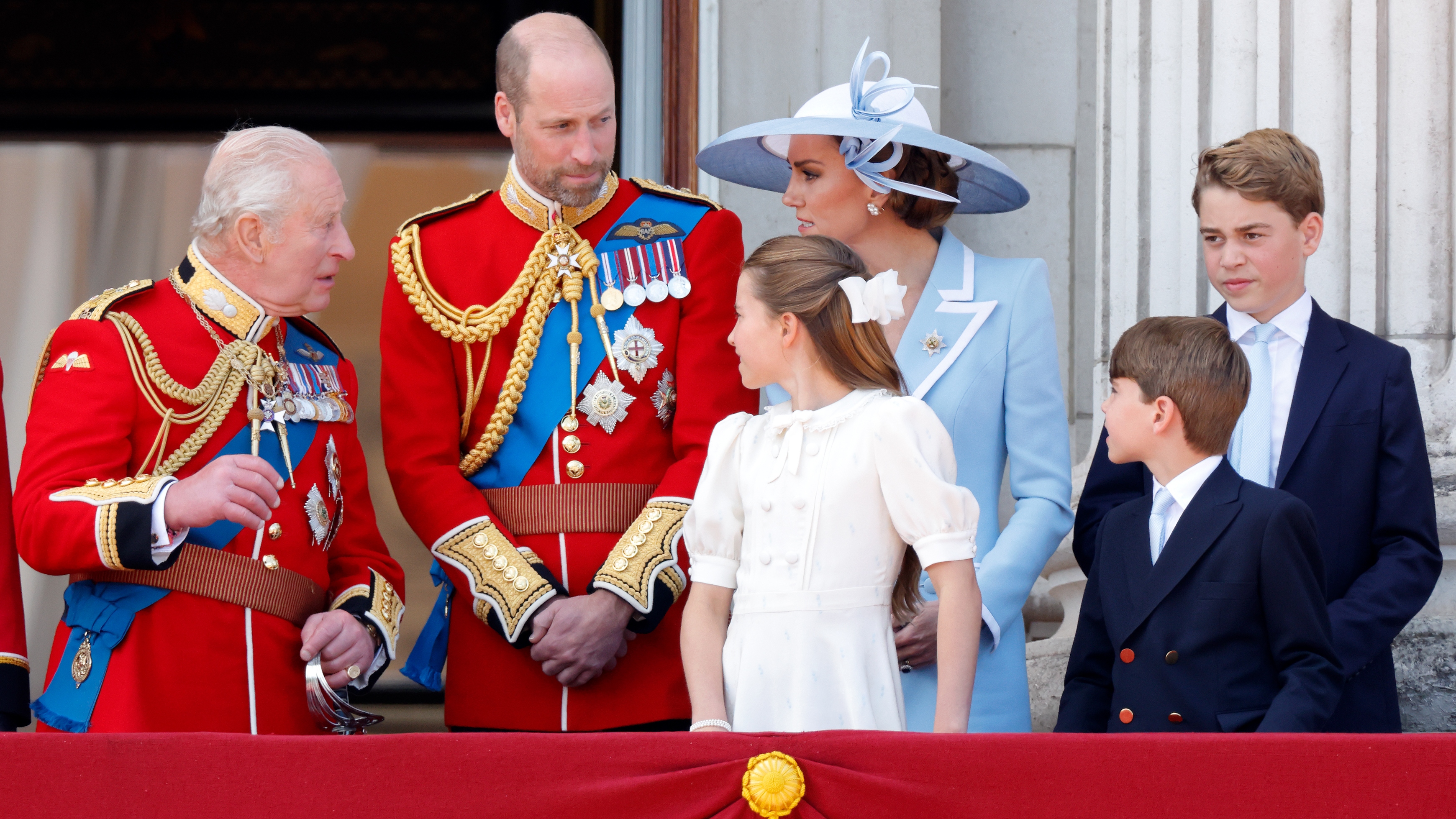 King Charles, Prince William, Catherine, Princess of Wales, Princess Charlotte, Prince George and Prince Louis watch an RAF flypast from the balcony of Buckingham Palace on June 13, 2026