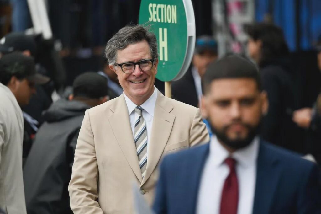Stephen sports a tan suit at the Grand Opening Ceremony of the Obama Presidential Center today