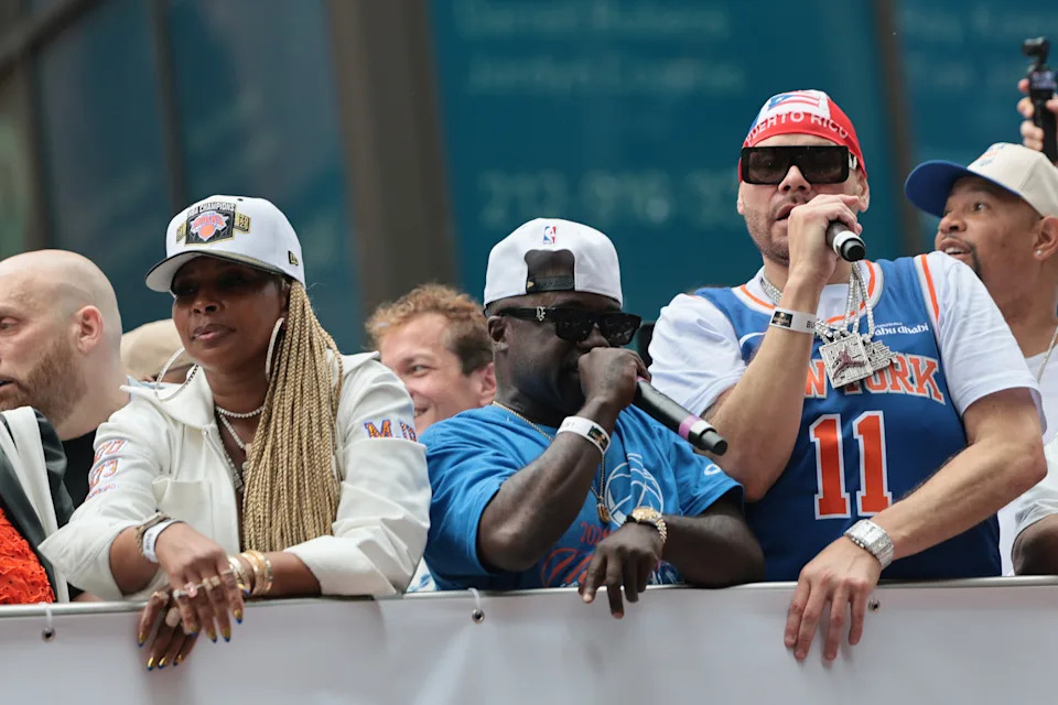 Mary J. Blige, Havoc and Fat Joe ride on a float.
