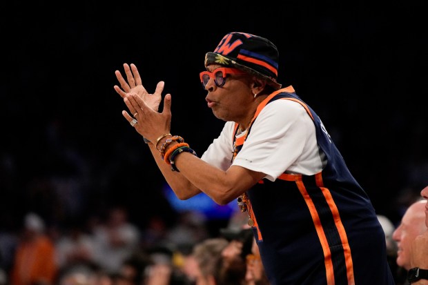 Filmmaker Spike Lee cheers during Game 3 of the NBA Finals basketball series between the San Antonio Spurs and the New York Knicks, Monday, June 8, 2026, in New York. (AP Photo/Ross D. Franklin)