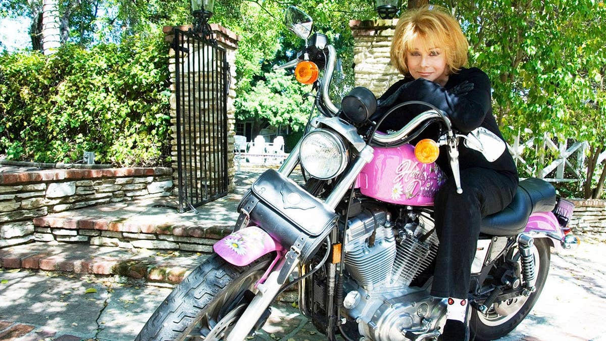 Ann-Margret on a motorcycle.