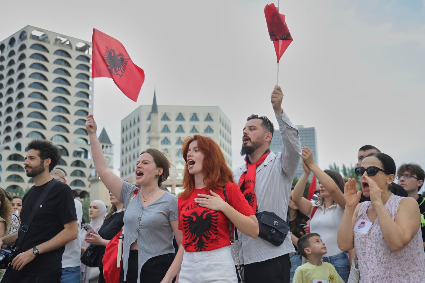 Protesters waved Albanian flags during a demonstration in Tirana, Albania, Wednesday.