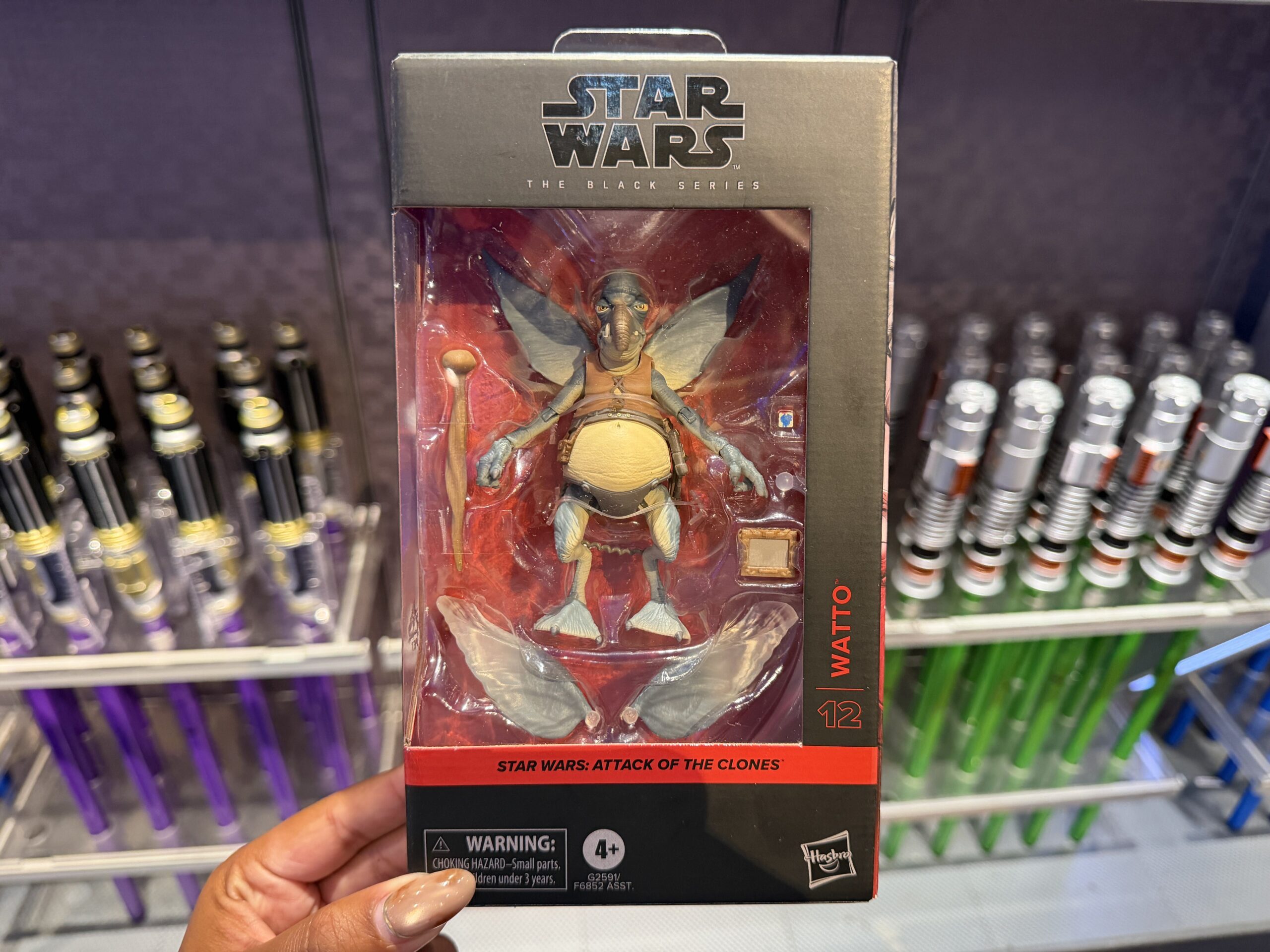 A new wave of Star Wars merchandise has arrived at Disneyland, including several graphic T-shirts, a keychain, and multiple Hasbro Black Series figures inspired by Star Wars: Attack of the Clones, The Mandalorian & Grogu, Star Tours, and more.