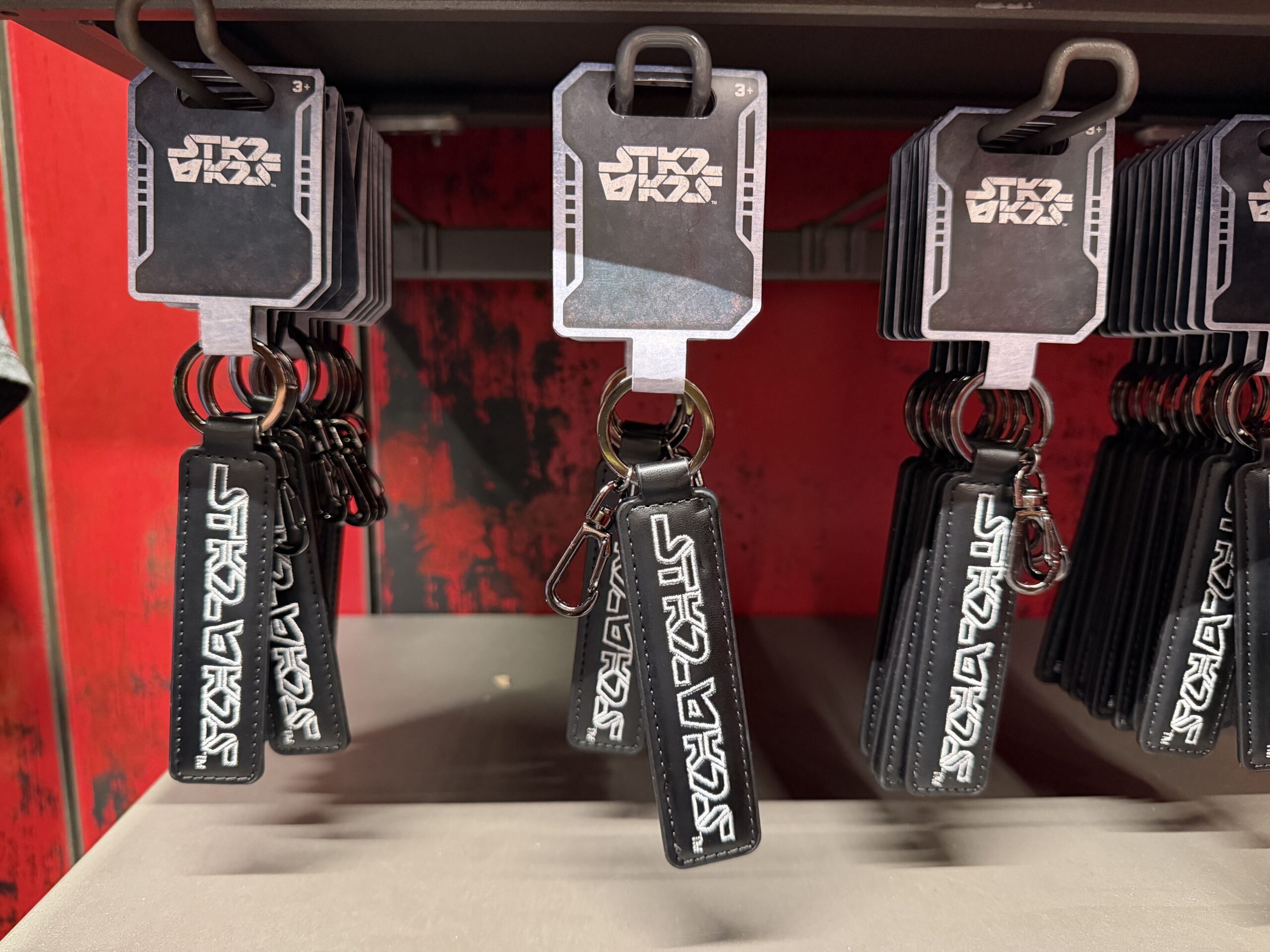A new wave of Star Wars merchandise has arrived at Disneyland, including several graphic T-shirts, a keychain, and multiple Hasbro Black Series figures inspired by Star Wars: Attack of the Clones, The Mandalorian & Grogu, Star Tours, and more.