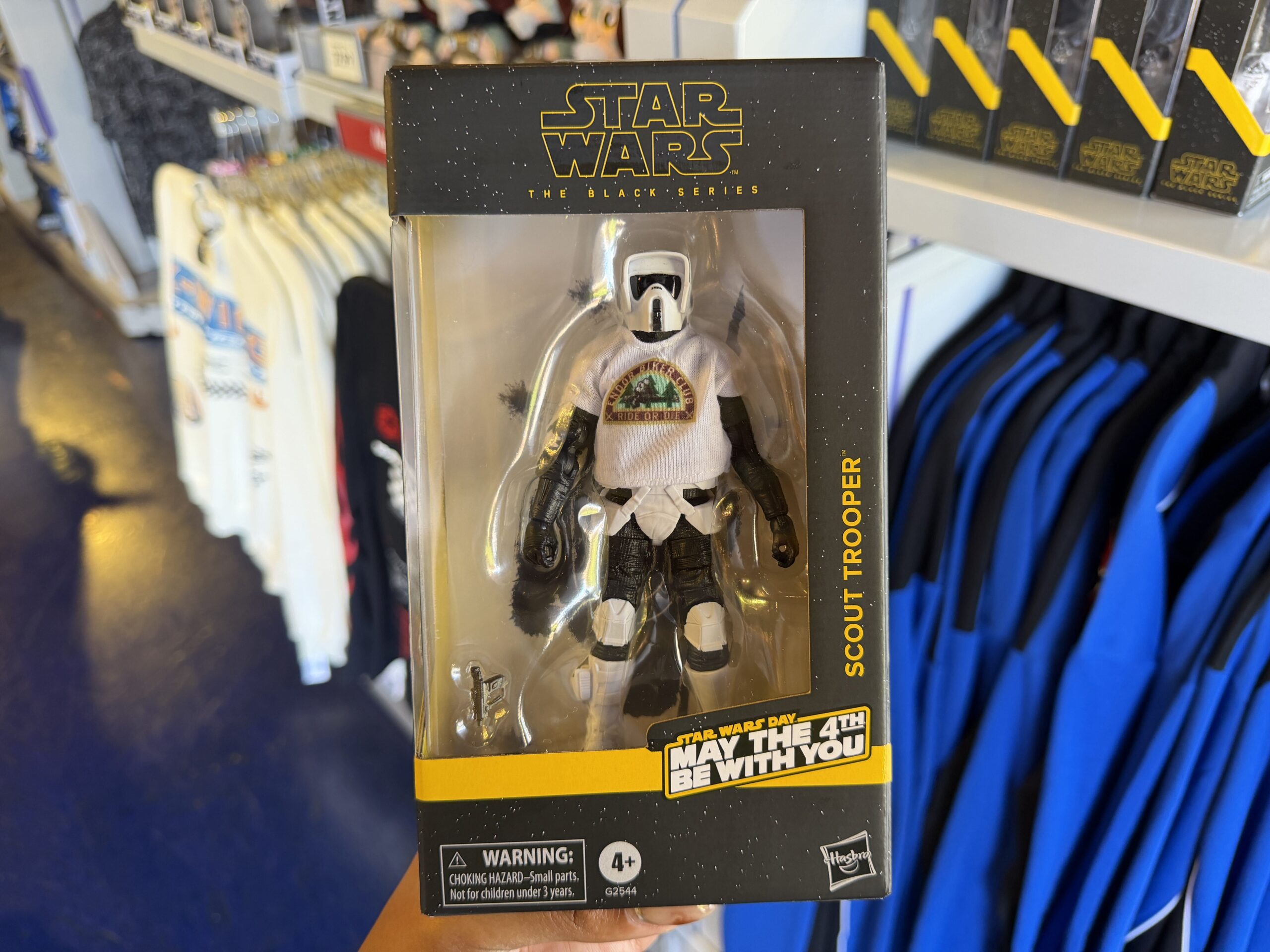 A new wave of Star Wars merchandise has arrived at Disneyland, including several graphic T-shirts, a keychain, and multiple Hasbro Black Series figures inspired by Star Wars: Attack of the Clones, The Mandalorian & Grogu, Star Tours, and more.
