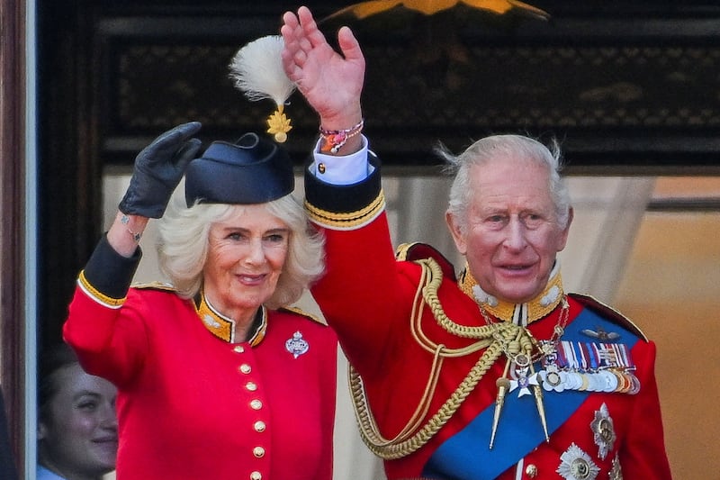 King Charles's bracelets were clearly visible as he waved from the balcony of Buckingham Palace during the Trooping the Colour parade on June 13, 2026.