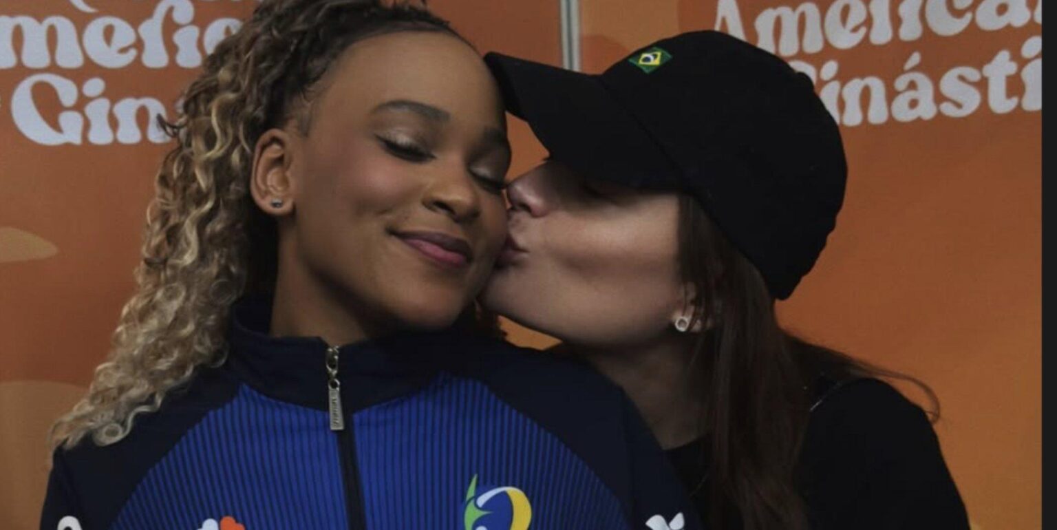 Brazilian Olympic gymnast Rebeca Andrade, comes out by sharing a photo with her girlfriend on instagram stories. The caption said, “Thank you for supporting me and being here at this important moment in my life! I love you.”