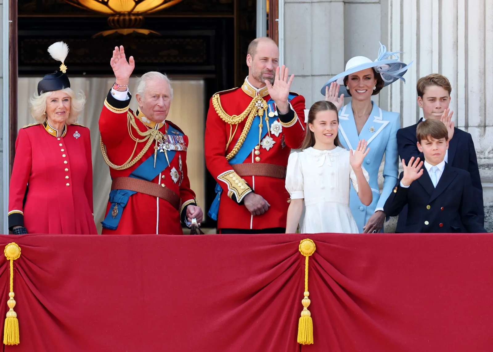 L-R: Queen Camilla, King Charles III, Prince William, Princess Charlotte, Princess Kate, Prince George and Prince Louis wave from the balcony of Buckingham Palace during Trooping The Colour on June 13, 2026.