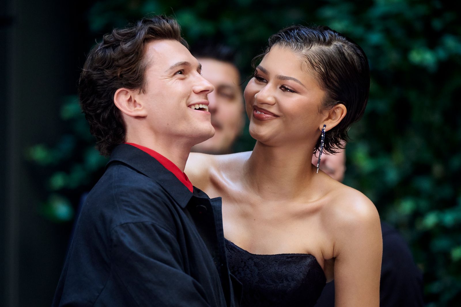 Image may contain Tom Holland Zendaya Accessories Earring Jewelry Head Person Face Happy Smile Adult and Wedding