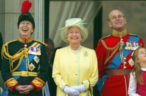 LONDON - JUNE 12: (L-R) Britain's Princess Anne, Queen Elizabeth II and her husband the Duke of Edinburgh watch a fly-over from the balcony of Buckingham Palace after attending the Trooping The Colour ceremony to mark her official birthday at Horse Guards Parade on June 12, 2004 in London, England. (Photo by Scott Barbour/Getty Images)