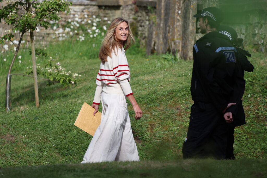 Harriet Sperling smiles at royal wedding rehearsal
