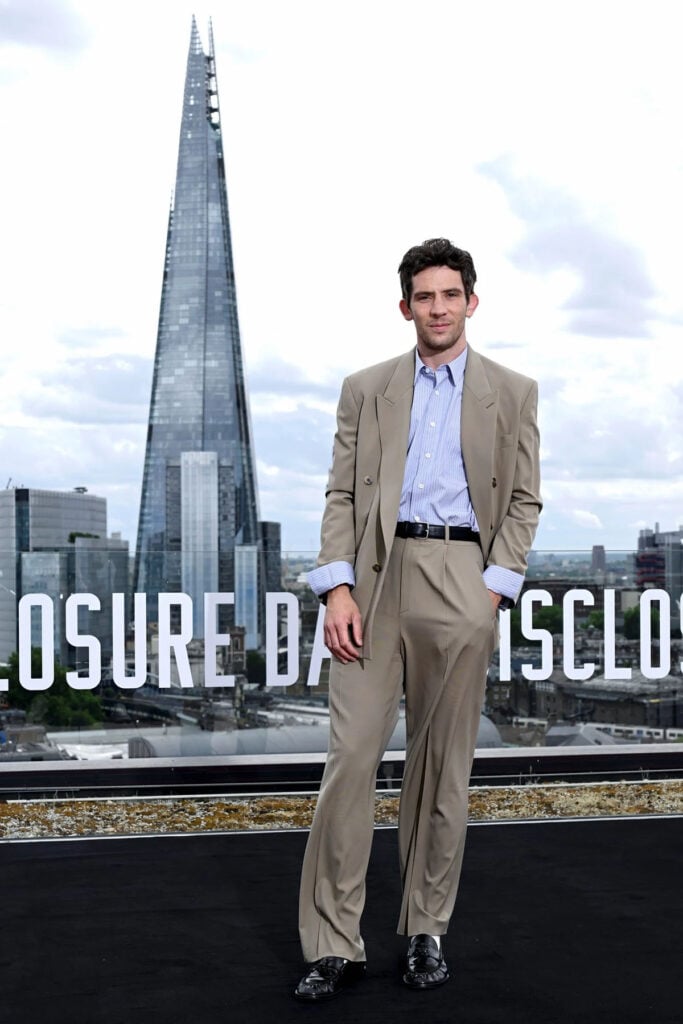 Josh O’Connor wearing a beige suit at the Disclosure Day photocall in London.