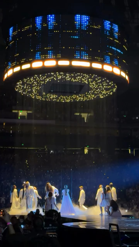 Ariana Grande performing a little stunt during “supernatural” at her “The Eternal Sunshine Tour” concert in Oakland California
