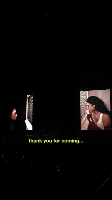 Lola Young in the confessional booth at Rosalía’s concert in London last month