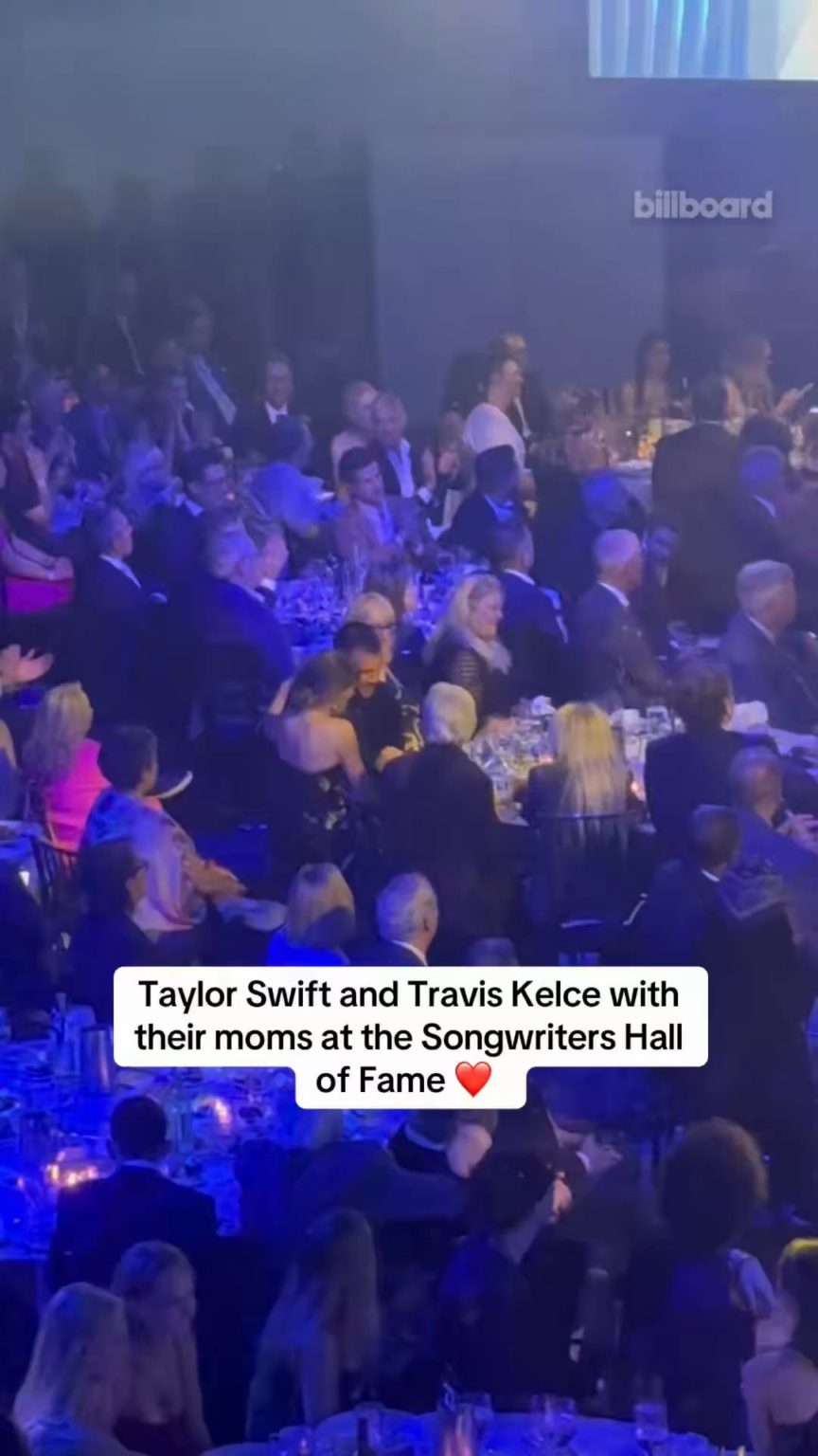 Travis Kelce has made it to the Songwriters Hall of Fame and is sitting with Taylor Swift and their moms!
