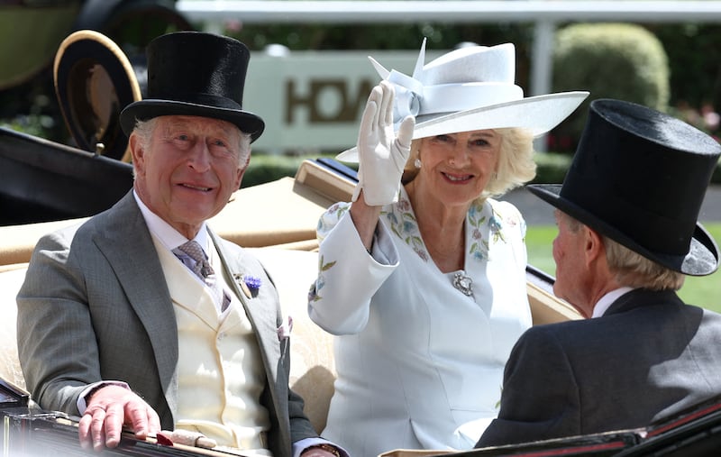 King Charles and Queen Camilla pictured in a horse and carriage during the royal procession ahead of the Royal Ascot races.