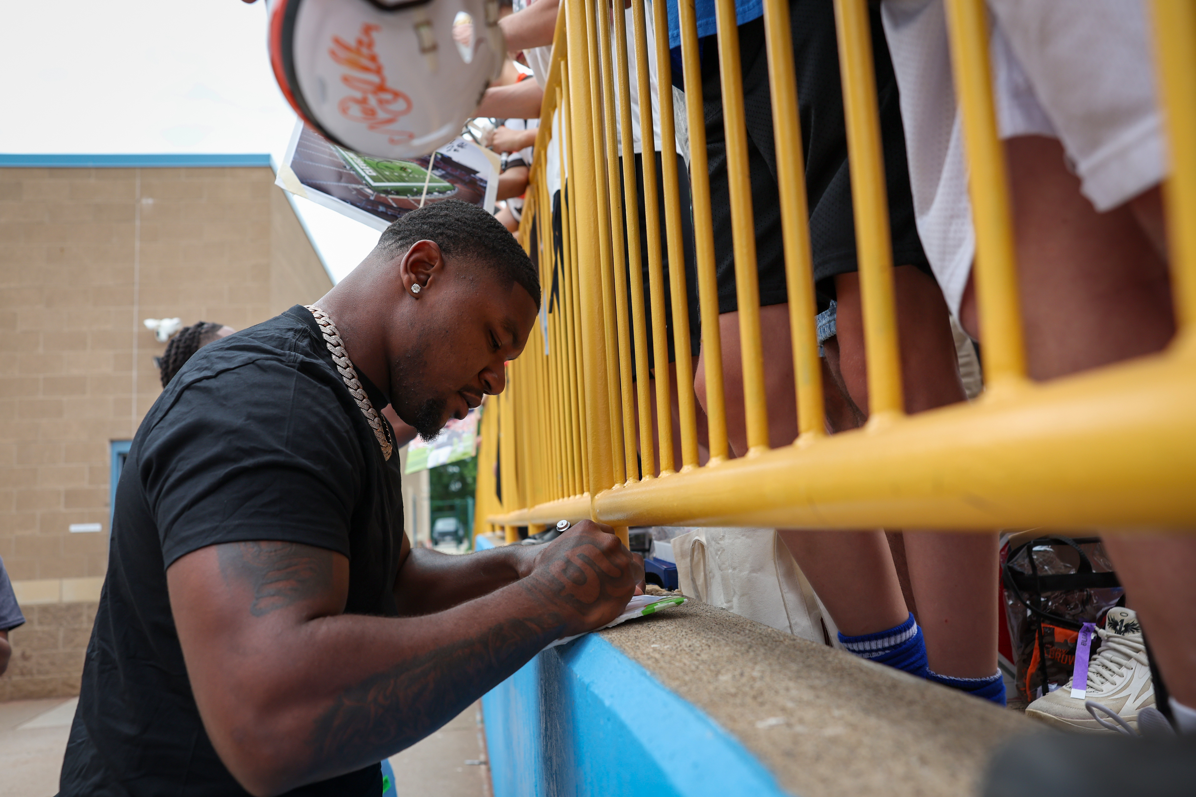 Photos from the Denzel Ward celebrity softball game, June 6,...